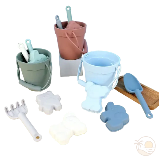 pelle et seau de plage vert rose bleu moules