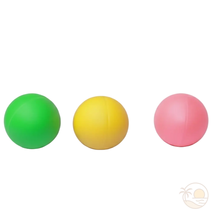 balles raquettes de plage vert jaune rose