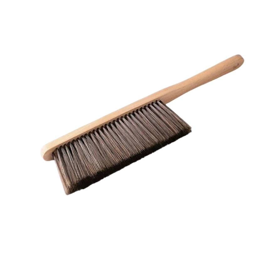 brosse à sable plage