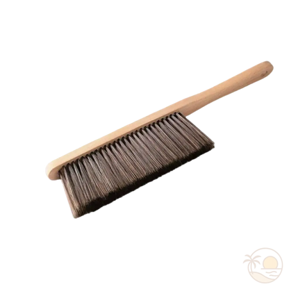 brosse à sable plage