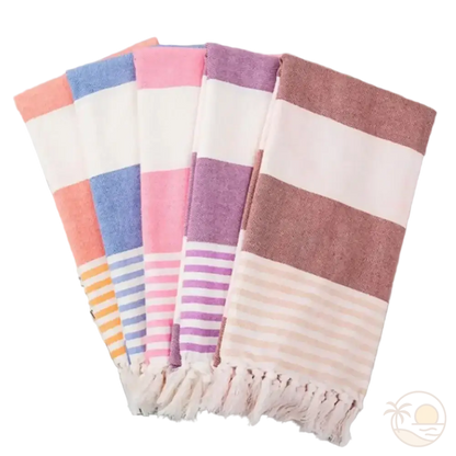 fouta plage coton pliees orange bleu rose violet marron