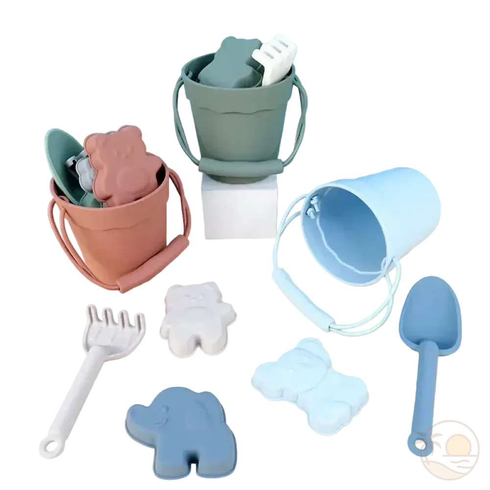 pelle et seau de plage rose vert bleu