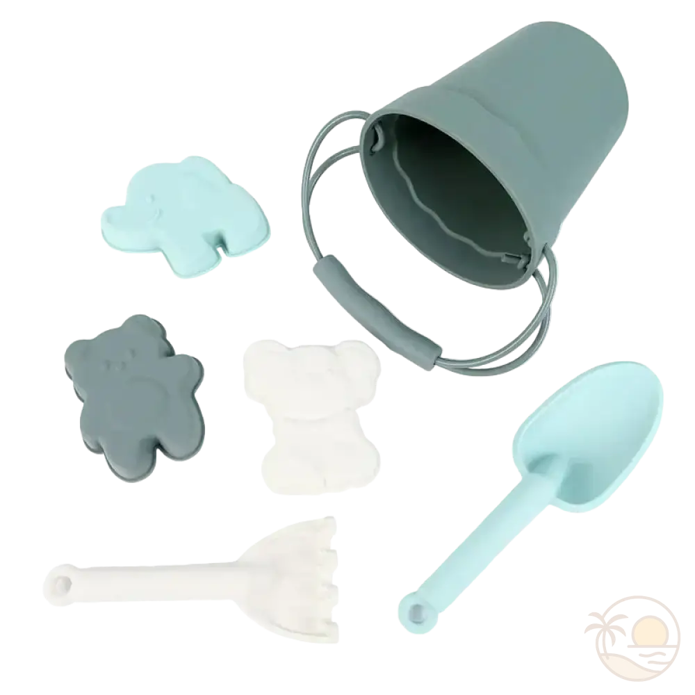 pelle et seau de plage vert