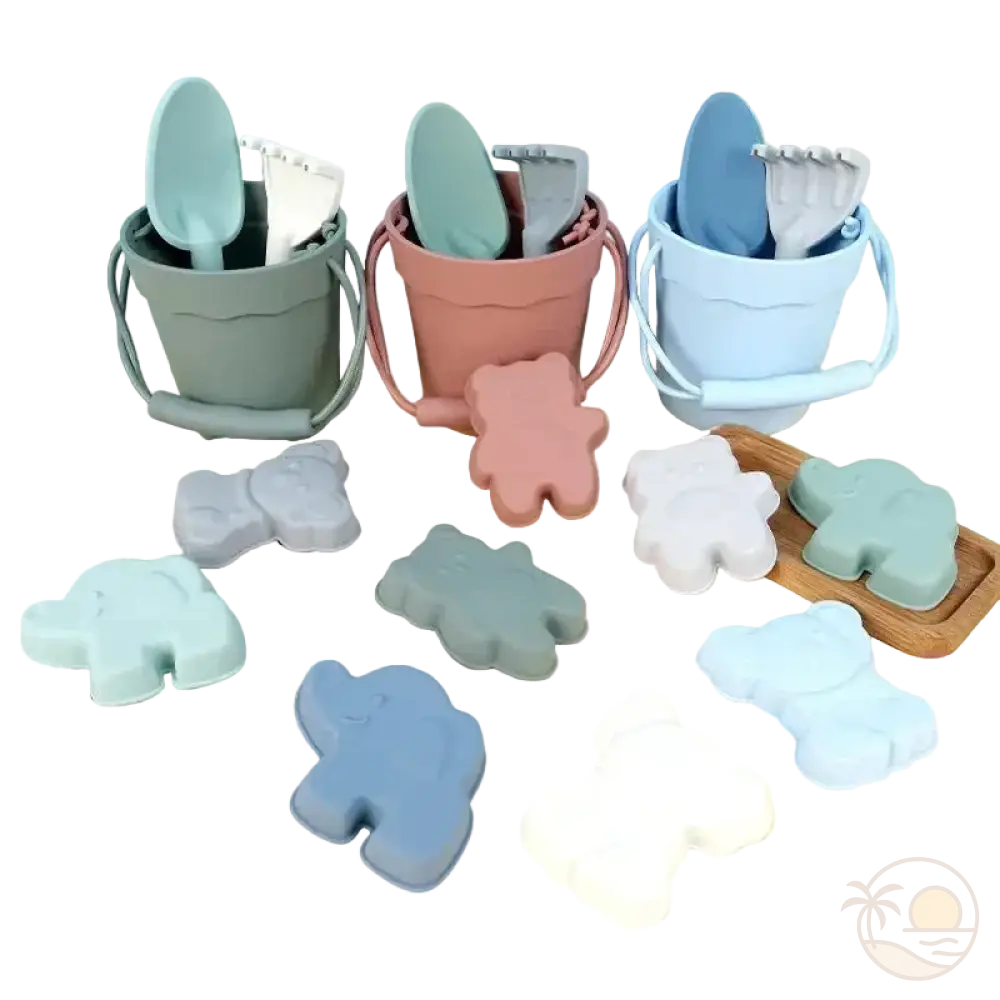 pelle et seau de plage vert rose bleu