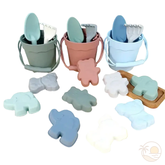 pelle et seau de plage vert rose bleu