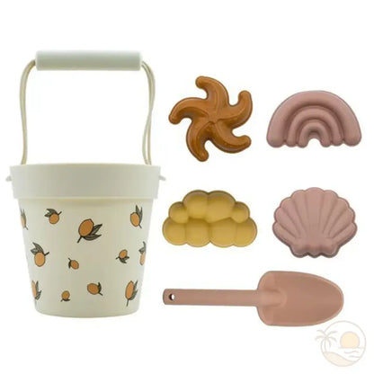 pelle seau plage citrons