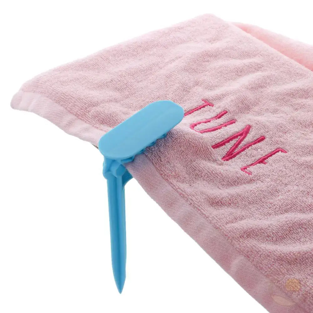 pince serviette de plage bleu serviette