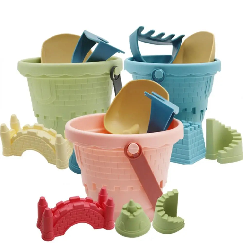seau de plage chateau fort rose vert bleu