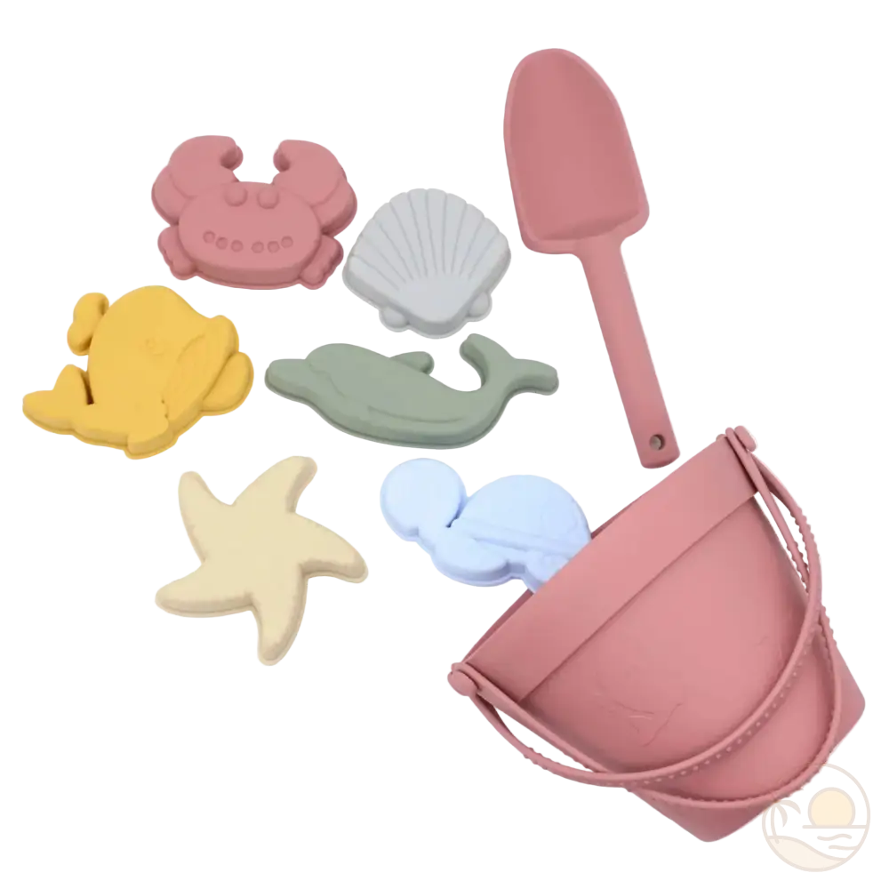 seau et pelle pour la plage rose moules