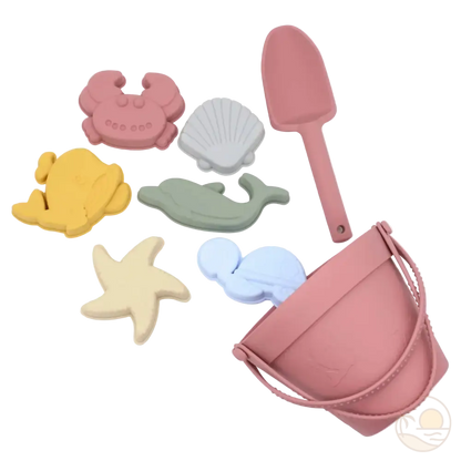 seau et pelle pour la plage rose moules