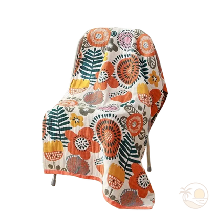 serviette de plage en coton fleurs jaunes oranges