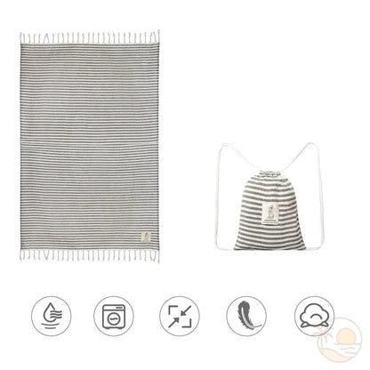 serviette de plage fouta roulee sac noir