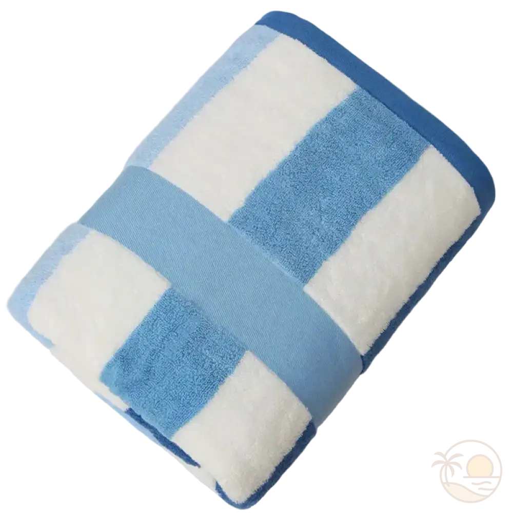 serviette de plage rayures bleu plie