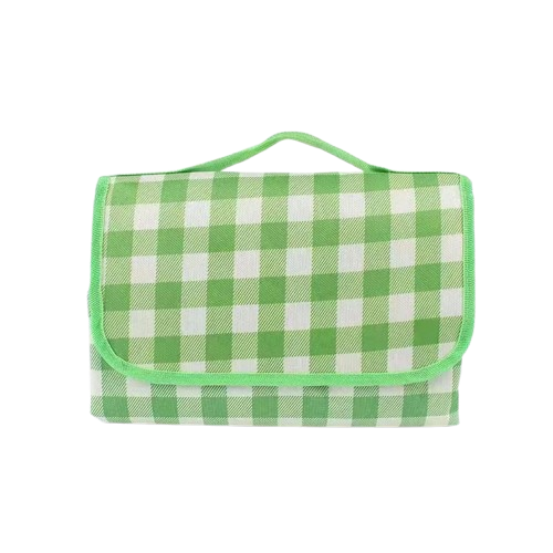 tapis de plage vert plie